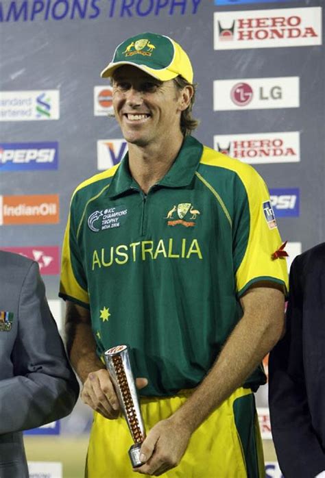 Flying Pigeon Glenn McGrath Poses With The Man Of The Match Award