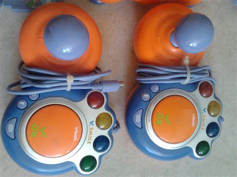 Vtech V.smile console with 11 games and 2 controllers - Catawiki