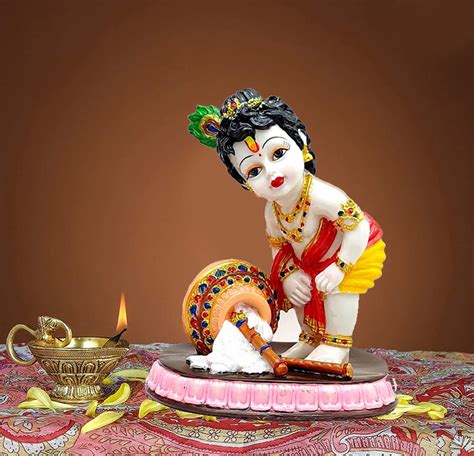 Buy SHREE RAM IMPEX Polyresin Lord Krishna Idol Yellow Hand Carved