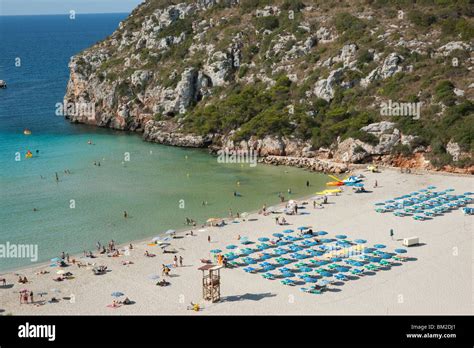 Detail of Cala en Porter beach with sand and sea Stock Photo - Alamy