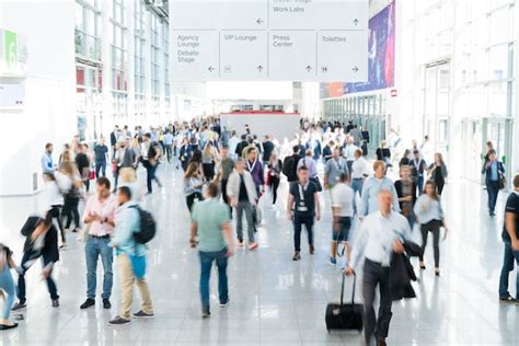 Premium Photo Blurred Business People At A Trade Fair