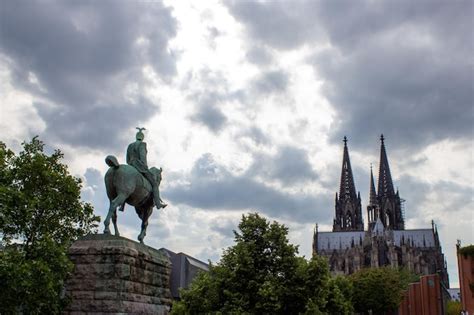 Premium Photo View Of Cologne Cathedral With Equestrian Statue Of