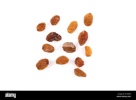 Sweet raisins on white Stock Photo - Alamy