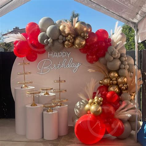 A Birthday Party With Balloons And Decorations