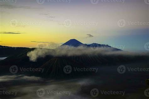 Beautiful colorful sunrise over Mount Bromo and wild island in Mount ...