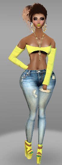 A Woman In Yellow Top And Jeans Posing For The Camera With Her Hands On