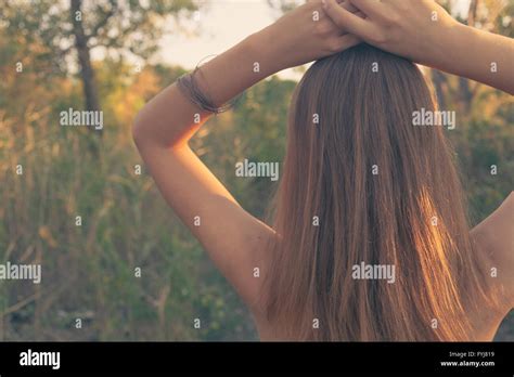 Free And Alone Blonde Against Sunset In Summer Stock Photo Alamy