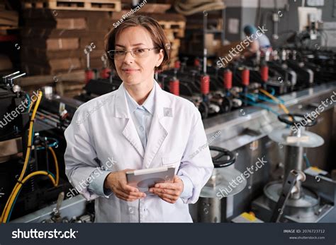 Portrait Female Factory Worker Wearing Glasses Stock Photo 2076723712