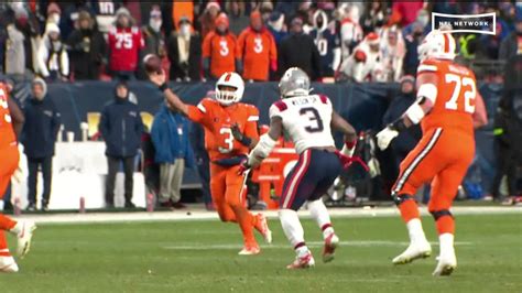 Denver Broncos Quarterback Russell Wilson Escapes The Pocket For