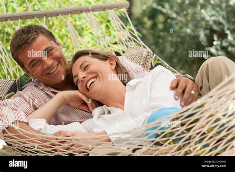 Couple Swing Garden Laughing Hi Res Stock Photography And Images Alamy