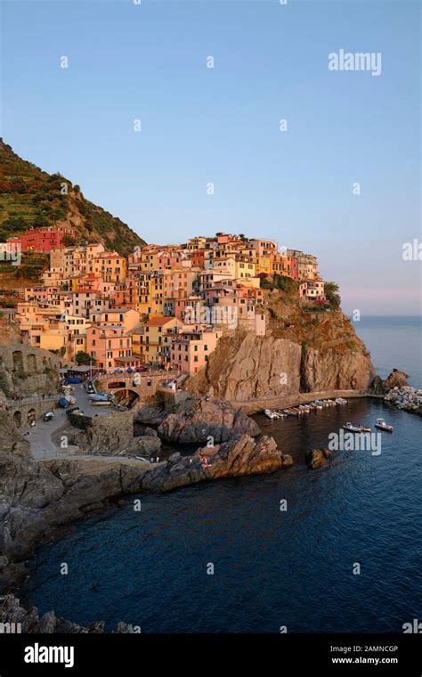 The Colourful Painted Houses And Harbour Of The Cliff Top Fishing