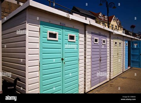 Beach Huts On The Seafront At Lyme Regis Dorset England Stock Photo