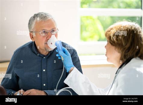 Asthma Copd Breath Nebulizer And Mask Given By Doctor Stock Photo Alamy