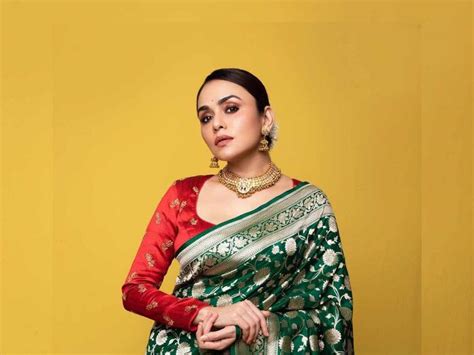 Actress Amruta Khanvilkar Looking Beautiful In Green Saree And Long