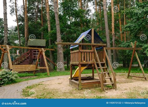 Children`s Playground. a Children`s Slide Made of Wood and Natural Materials. Stock Photo ...