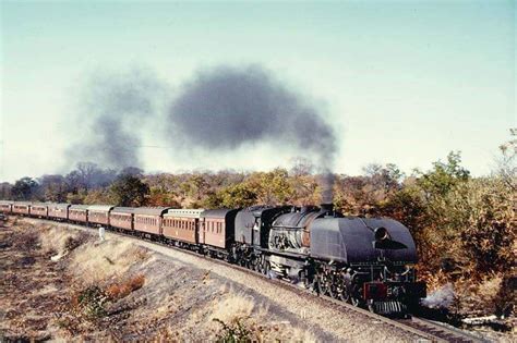 A Garratt Type Locomotive Hauling A Passenger Train Most Trains In