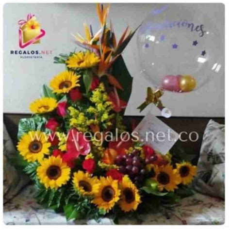 Arreglo Floral Con Rosas Girasoles Y Frutas Y Globo Regalos Net