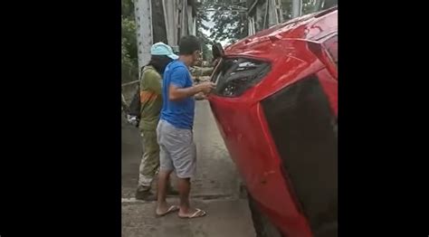 Impressionante vídeo mostra carro que capotou em cima de uma ponte