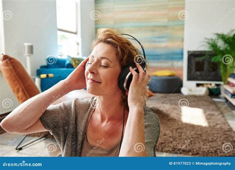 Carefree Older Woman Listening To Music At Home Stock Image Image Of