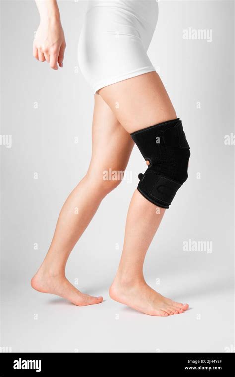 Knee Support Brace On Leg Isolated On White Background Elastic