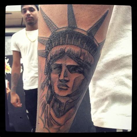 Statue Of Liberty Tattoo Located On The Forearm