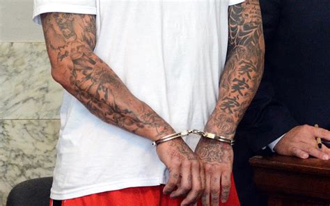 Officials examining Aaron Hernandez's tattoos for gang ties - CBSSports.com