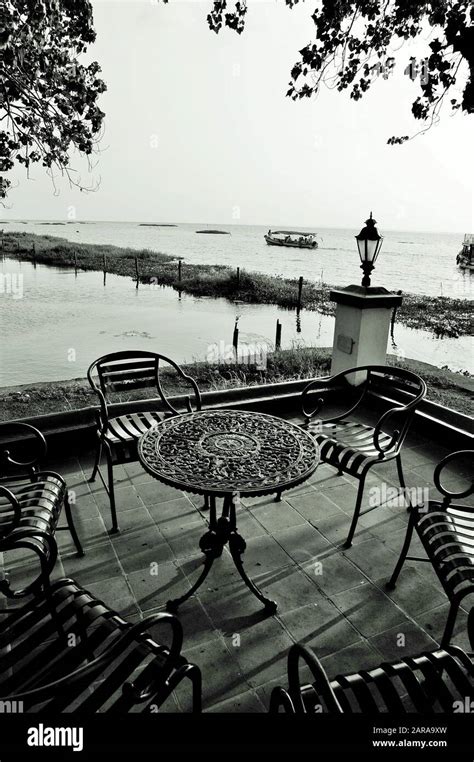 Table and chairs, Vembanad lake, Coconut Lagoon Resort, Kumarakom ...