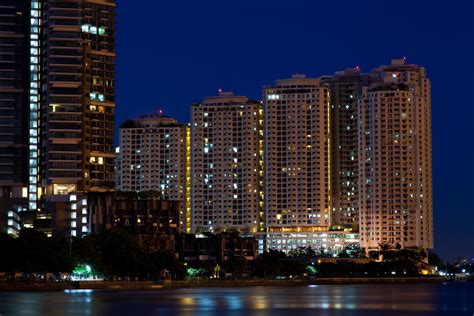 condominiums  skyscrapers  night  stock photo  vecteezy
