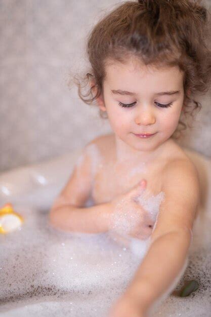 Premium Photo Cute Girl Bathing In Bathroom