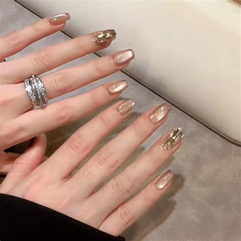 Buy Secret Lives Cats Eye Reusable Artificial Nude Brown Color With Golden Glitter Crystal