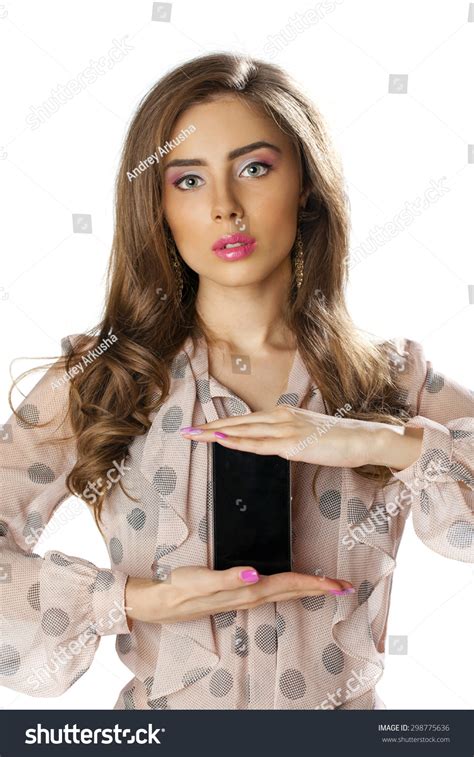Sexy Brunette Showing Smart Phone Isolated Stock Photo