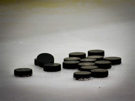 What Is A Hockey Puck Made Of - Going Bar Down