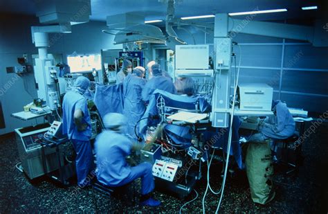 Surgery Team Conducting Open Heart Surgery Stock Image M