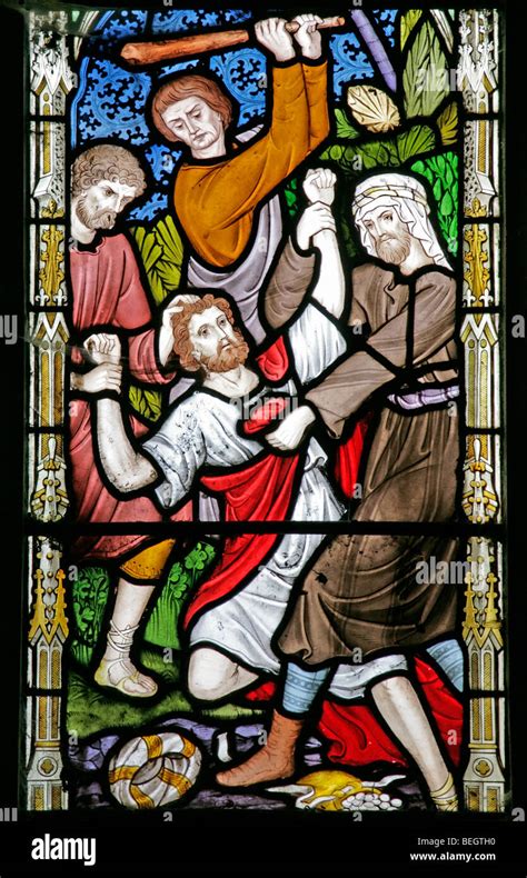 A Stained Glass Window Depicting The Story Of The Good Samaritan By