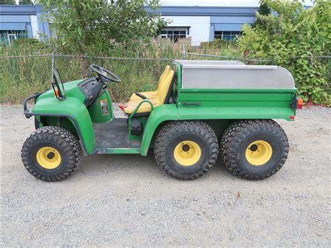 John Deere Gator 6x4 Hyd Dump Bed Kenmore Heavy Equipment Contractors Equipment And Vehicles