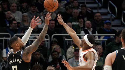 Lillard Hits Milestone Giannis Has Triple Double As Bucks Beat Spurs