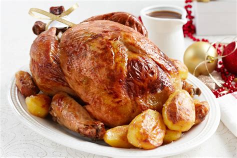 Traditional Roast Turkey With Gravy And Cranberry Sauce