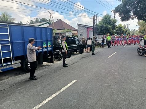 Kapolsek Marga Pimpin Pengamanan Gerak Jalan Merah Putih Barbareto