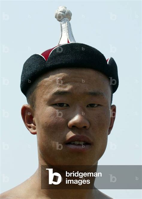 Image Of Mongolian Wears Traditional Headgear During Naadam Festival In Ulan Bator 2003 07 11