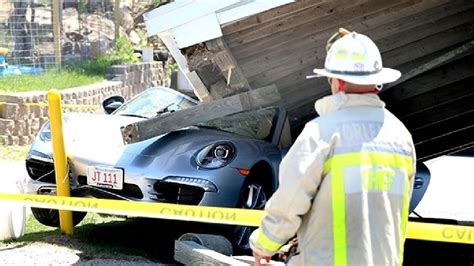 Porsche Crushed Under Roof Overhang