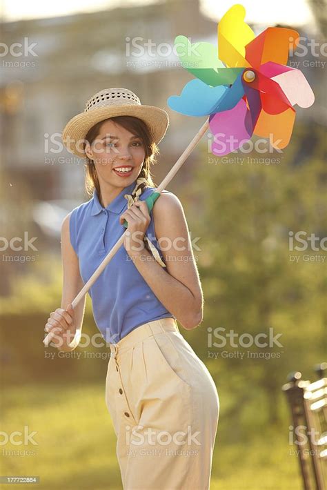 Funny Girl With Weather Vane Stock Photo - Download Image Now - Adult ...