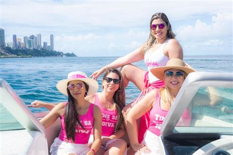Premium Photo Women In Bikini On A Boat Smiling At The Camera