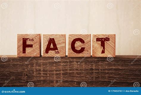 Fact Word Written In Wooden Cube Fake And Real Fact And News Concept