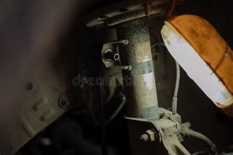 Replacement And Repair Of Wheels And Shock Absorbers On A Car In A