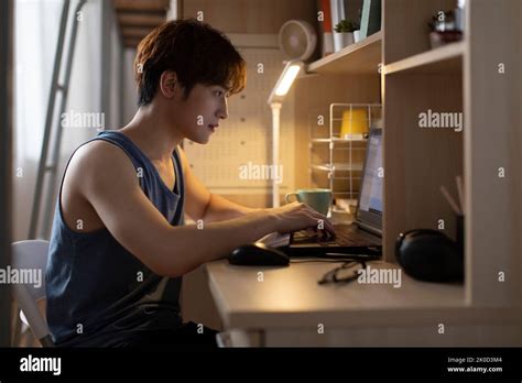 Young Chinese University Student Learning In Dormitory Stock Photo Alamy