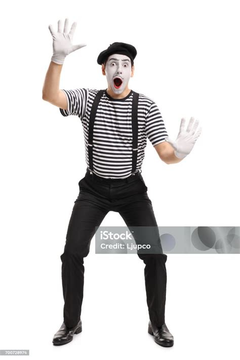 Mime Holding His Hands On An Invisible Wall Stock Photo Download