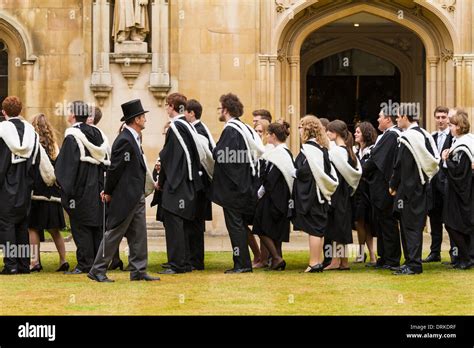 Cambridge University Students Gowns On Graduation Day At Corpus Christi