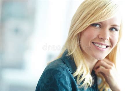 Shes Got Confidence A Beautiful Smiling Blonde Woman Looking To The Side With Copyspace Stock