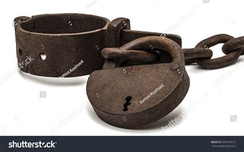 Rusty Old Shackles With Padlock Used For Locking Up Prisoners Or Slaves