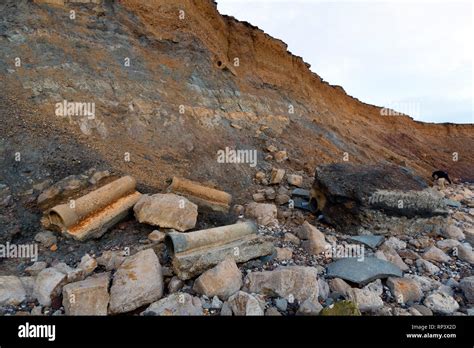 Coastal, Erosion, debris, on the, beach, pipes, cracks, cliffs, lower ...